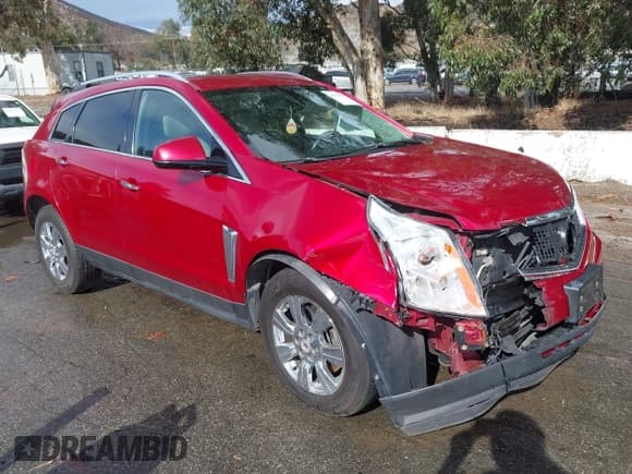 ✅ 2014 Cadillac SRX Luxury Collection • VIN: 3GYFNEE39ES669907 • Lot: 43769877. Listed on IAAI with 163,691 mi. Free auction sales archive from the USA and detailed vehicle history report at DreamBid. Image 1.