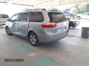 ✅ 2015 Toyota Sienna LE • VIN: 5TDKK3DC2FS532946 • Lot: 43737580. Listed on IAAI with 57,527 mi. Free auction sales archive from the USA and detailed vehicle history report at DreamBid. Image 3.