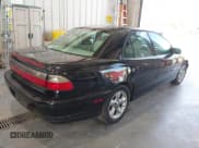 ✅ 1997 Cadillac Catera • VIN: W06VR54R9VR162389 • Lot: 40142990. Listed on IAAI with 111,558 mi. Free auction sales archive from the USA and detailed vehicle history report at DreamBid. Image 4.