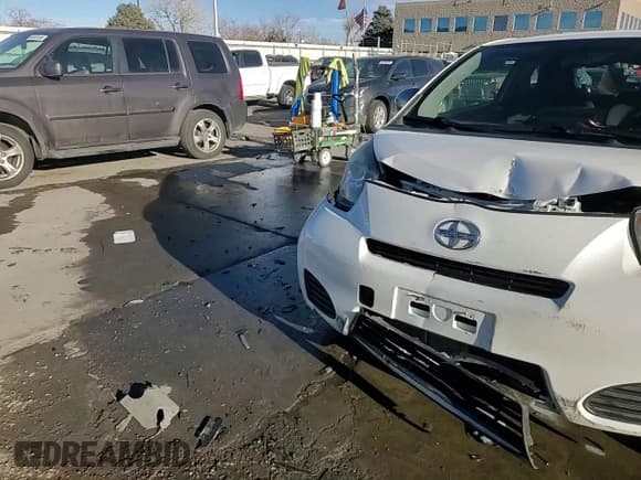 ✅ 2014 Scion iQ • VIN: JTNJJXB01EJ026837 • Lot: 43596385. Wystawiony na Copart z przebiegiem 52 826 mil. Bezpłatny archiwum sprzedaży aukcyjnych z USA i szczegółowy raport historii pojazdu na DreamBid. Zdjęcie 12.