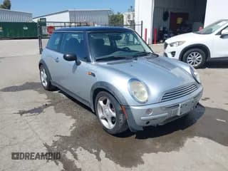 ✅ 2004 MINI Hardtop • VIN: WMWRC33444TJ53562 • Lot: 42538275. Listed on IAAI with 162,537 mi. Free auction sales archive from the USA and detailed vehicle history report at DreamBid. Image 1.
