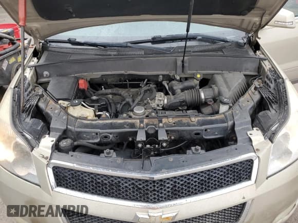 ✅ 2009 Chevrolet Traverse 2LT • VIN: 1GNER23D69S165680 • Lot: 73761384. Wystawiony na Copart z przebiegiem 136 703 mil. Bezpłatny archiwum sprzedaży aukcyjnych z USA i szczegółowy raport historii pojazdu na DreamBid. Zdjęcie 12.