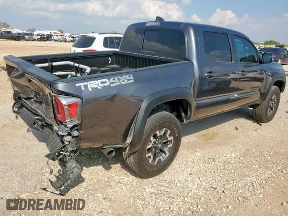 ✅ 2023 Toyota Tacoma TRD Off Road • VIN: 3TYCZ5AN0PT165987 • Lot: 90329665. Listed on Copart with 24,860 mi. Free auction sales archive from the USA and detailed vehicle history report at DreamBid. Image 3.