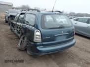 ✅ 2002 Saturn LW • VIN: 1G8JU84F12Y566883 • Lot: 43757094. Listed on IAAI with 215,469 mi. Free auction sales archive from the USA and detailed vehicle history report at DreamBid. Image 3.