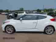 2012 Hyundai Veloster w/Gray Int with VIN KMHTC6AD3CU051395, listed as a IAAI auction lot 42489038 with 153,319 mi miles and . Bid and sale history available at DreamBid. Image 6.