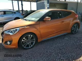 ✅ 2016 Hyundai Veloster Turbo • VIN: KMHTC6AE3GU303046 • Lot: 80927325. Listed on Copart with 75,326 mi. Free auction sales archive from the USA and detailed vehicle history report at DreamBid. Image 1.