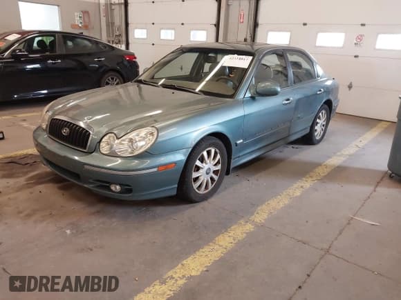 ✅ 2004 Hyundai Sonata GLS • VIN: KMHWF35HX4A004657 • Lot: 42334017. Listed on IAAI with 123,676 mi. Free auction sales archive from the USA and detailed vehicle history report at DreamBid. Image 2.