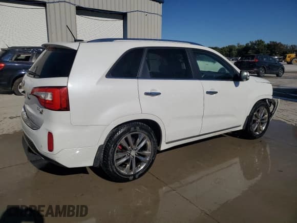 ✅ 2014 Kia Sorento SX • VIN: 5XYKW4A70EG498647 • Lot: 86869395. Listed on Copart with 106,312 mi. Free auction sales archive from the USA and detailed vehicle history report at DreamBid. Image 3.