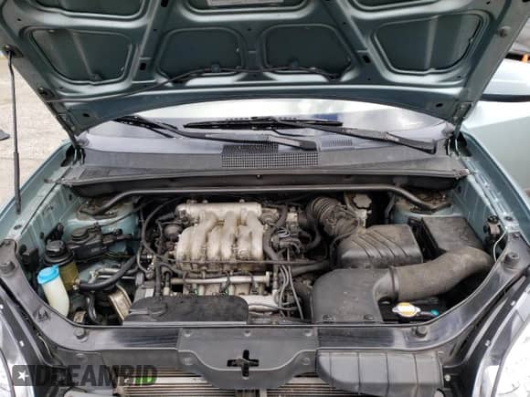 2005 Hyundai Tucson GLS z VIN KM8JN72D75U142775, wystawiony jako Copart lot #53075834 z przebiegiem 174 100 mil mil oraz Szkoda całkowita • Salvage title. Historia ofert i sprzedaży dostępna na DreamBid. Obrazek 14.