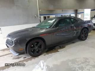 2013 Dodge Challenger R/T z VIN 2C3CDYBTXDH667994, wystawiony jako Copart lot #80292785 z przebiegiem 103 977 mil mil oraz Szkoda całkowita • Salvage title. Historia ofert i sprzedaży dostępna na DreamBid. Obrazek 1.