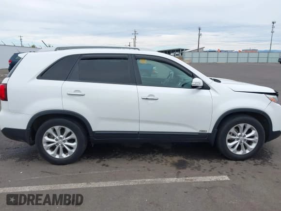✅ 2015 Kia Sorento EX • VIN: 5XYKUDA72FG640648 • Lot: 43340888. Listed on IAAI with 61,232 mi. Free auction sales archive from the USA and detailed vehicle history report at DreamBid. Image 13.