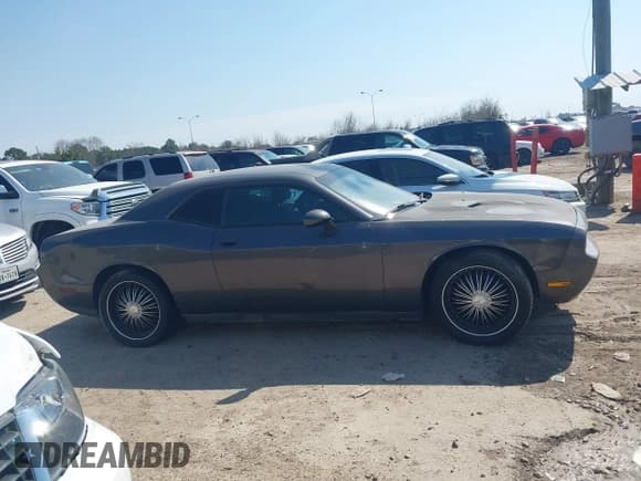 ✅ 2013 Dodge Challenger Rallye Redline • VIN: 2C3CDYAG7DH670128 • Lot: 41588960. Wystawiony na IAAI z przebiegiem 188 945 mil. Bezpłatny archiwum sprzedaży aukcyjnych z USA i szczegółowy raport historii pojazdu na DreamBid. Zdjęcie 13.