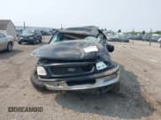 ✅ 1998 Ford F-150 XL • VIN: 1FTRX08L5WKC13654 • Lot: 42402628. Listed on IAAI with 128,541 mi. Free auction sales archive from the USA and detailed vehicle history report at DreamBid. Image 13.