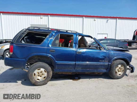 ✅ 1999 Chevrolet Blazer LT • VIN: 1GNDT13W6X2151512 • Lot: 41823548. Wystawiony na IAAI z przebiegiem Nie podano. Bezpłatny archiwum sprzedaży aukcyjnych z USA i szczegółowy raport historii pojazdu na DreamBid. Zdjęcie 14.