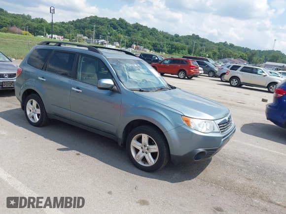 ✅ 2009 Subaru Forester X • VIN: JF2SH63609H766458 • Lot: 42621929. Listed on IAAI with 152,235 mi. Free auction sales archive from the USA and detailed vehicle history report at DreamBid. Image 1.