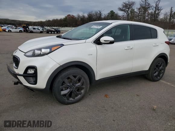 ✅ 2022 Kia Sportage LX • VIN: KNDPMCAC9N7011588 • Лот: 92376435. Опубликован ранее на Copart с пробегом 59 990 миль. Бесплатный доступ к архиву аукционных продаж из США и подробный отчёт об истории автомобиля на DreamBid. Изображение 1.