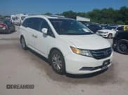 ✅ 2014 Honda Odyssey EX-L • VIN: 5FNRL5H61EB001509 • Lot: 42371539. Listed on IAAI with 259,195 mi. Free auction sales archive from the USA and detailed vehicle history report at DreamBid. Image 1.
