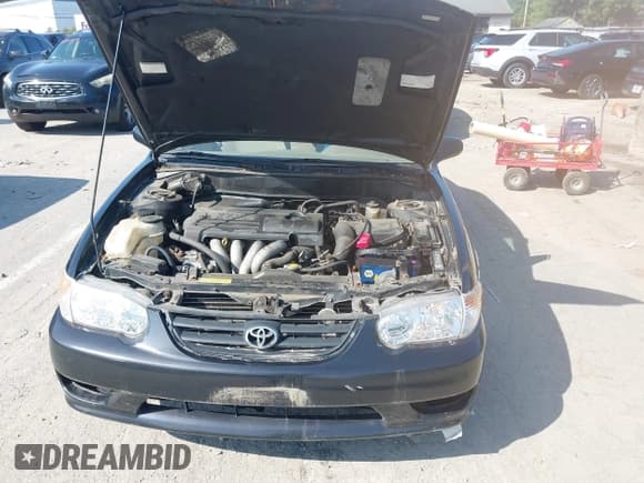 ✅ 2001 Toyota Corolla CE • VIN: 2T1BR12E01C468749 • Lot: 43194503. Listed on IAAI with 122,632 mi. Free auction sales archive from the USA and detailed vehicle history report at DreamBid. Image 10.