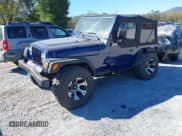 ✅ 1997 Jeep Wrangler Sport • VIN: 1J4FY19S7VP450928 • Лот: 43473204. Опубликован ранее на IAAI с пробегом 145 685 миль. Бесплатный доступ к архиву аукционных продаж из США и подробный отчёт об истории автомобиля на DreamBid. Изображение 2.