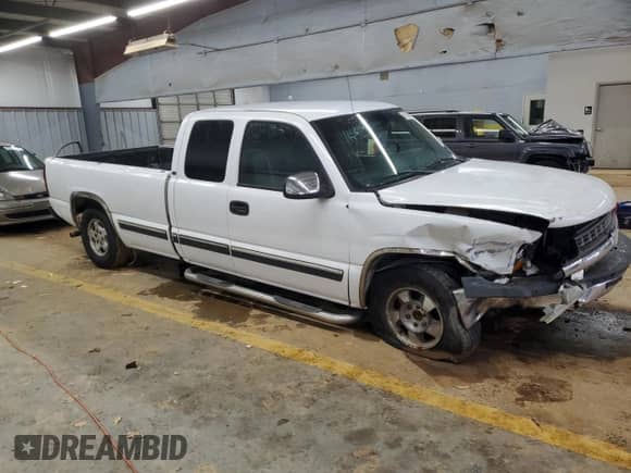 2002 Chevrolet Silverado 1500 with VIN 1GCEC19T72E234402, listed as a Copart auction lot 85130274 with 205,415 mi miles and Salvage title. Bid and sale history available at DreamBid. Image 4.