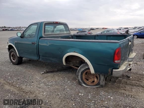 ✅ 1997 Ford F-150 • VIN: 1FTDF18W0VKC65074 • Lot: 50323755. Listed on Copart with 338,454 mi. Free auction sales archive from the USA and detailed vehicle history report at DreamBid. Image 2.