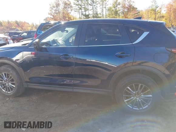 ✅ 2021 Mazda CX-5 Touring • VIN: JM3KFBCM2M0446455 • Lot: 43464164. Wystawiony na IAAI z przebiegiem 161 106 mil. Bezpłatny archiwum sprzedaży aukcyjnych z USA i szczegółowy raport historii pojazdu na DreamBid. Zdjęcie 14.