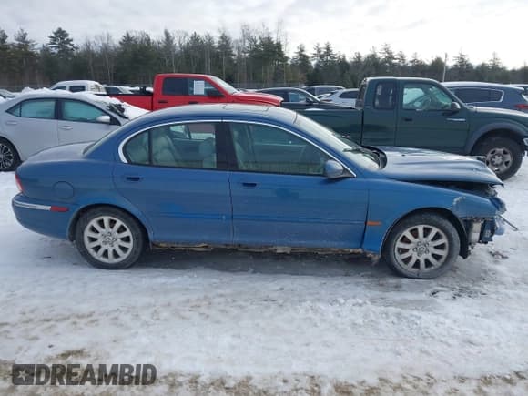 ✅ 2002 Jaguar X-Type • VIN: SAJEA51D82XC71954 • Lot: 41614240. Listed on IAAI with 96,466 mi. Free auction sales archive from the USA and detailed vehicle history report at DreamBid. Image 14.