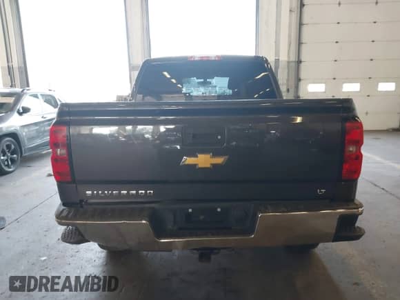 2016 Chevrolet Silverado 1500 LT with VIN 3GCUKREC6GG129840, listed as a IAAI auction lot 43088052 with 123,184 mi miles and . Bid and sale history available at DreamBid. Image 17.