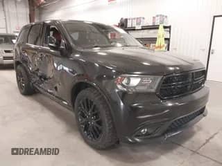 2015 Dodge Durango R/T with VIN 1C4SDJCTXFC105726, listed as a IAAI auction lot 40943929 with 109,116 mi miles and . Bid and sale history available at DreamBid. Image 1.