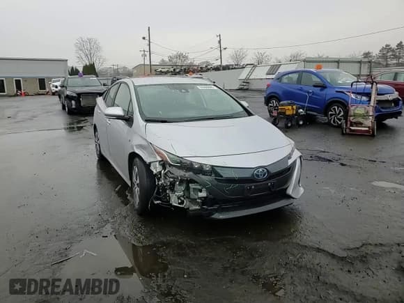 ✅ 2022 Toyota Prius LE • VIN: JTDKAMFP8N3222826 • Lot: 93900645. Listed on Copart with 25,650 mi. Free auction sales archive from the USA and detailed vehicle history report at DreamBid. Image 13.
