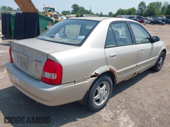 ✅ 2000 Mazda Protege DX • VIN: JM1BJ2228Y0222829 • Лот: 42849407. Опубликован ранее на IAAI с пробегом 228 000 миль. Бесплатный доступ к архиву аукционных продаж из США и подробный отчёт об истории автомобиля на DreamBid. Изображение 4.