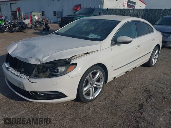 ✅ 2013 Volkswagen CC R-Line • VIN: WVWBP7ANXDE521906 • Lot: 42975126. Listed on IAAI with 87,359 mi. Free auction sales archive from the USA and detailed vehicle history report at DreamBid. Image 2.