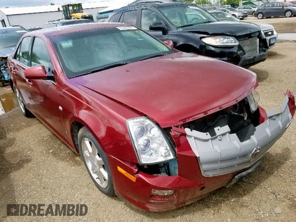 ✅ 2006 Cadillac STS • VIN: 1G6DC67A460209697 • Лот: 43802859. Опубликован ранее на Copart с пробегом 117 955 миль. Бесплатный доступ к архиву аукционных продаж из США и подробный отчёт об истории автомобиля на DreamBid. Изображение 1.