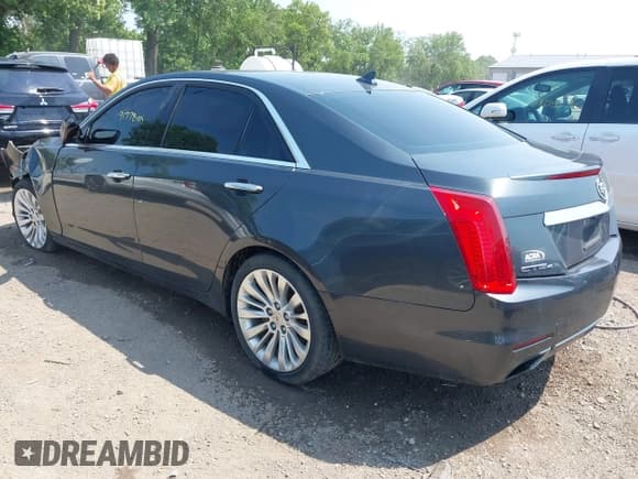 ✅ 2014 Cadillac CTS Luxury AWD • VIN: 1G6AX5SX4E0188796 • Lot: 42447749. Listed on IAAI with 91,778 mi. Free auction sales archive from the USA and detailed vehicle history report at DreamBid. Image 3.