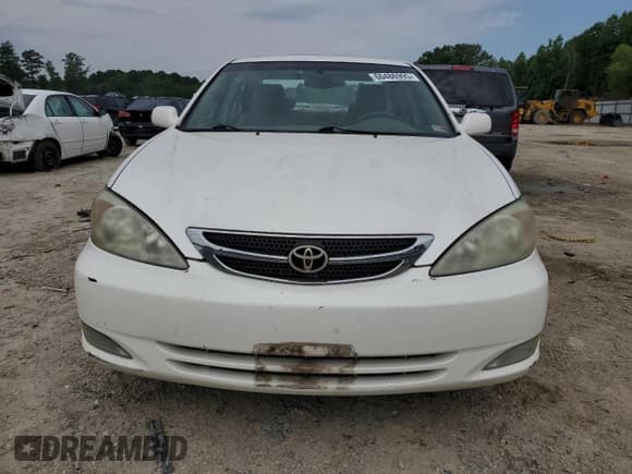 ✅ 2004 Toyota Camry LE • VIN: JTDBE32K440281087 • Лот: 60486995. Опубликован ранее на Copart с пробегом 229 856 миль. Бесплатный доступ к архиву аукционных продаж из США и подробный отчёт об истории автомобиля на DreamBid. Изображение 5.
