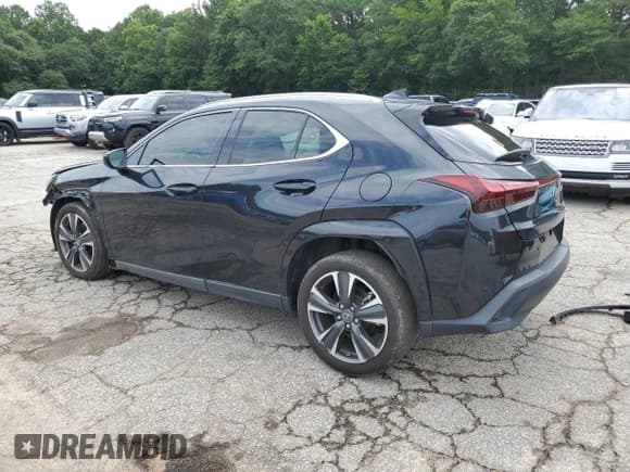 ✅ 2023 Lexus UX 250h Premium • VIN: JTHP6JBH8P2133821 • Lot: 61007355. Listed on Copart with 32,540 mi. Free auction sales archive from the USA and detailed vehicle history report at DreamBid. Image 2.