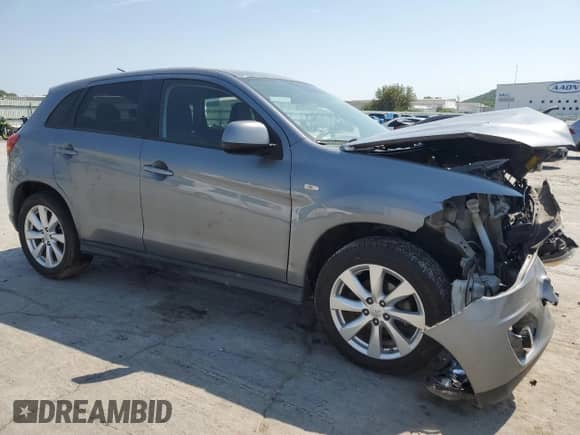 2015 Mitsubishi Outlander ES with VIN 4A4AP3AU2FE022752, listed as a Copart auction lot 71730925 with 212,695 mi miles and Salvage title. Bid and sale history available at DreamBid. Image 4.