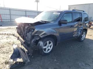 2012 Honda Pilot LX with VIN 5FNYF4H26CB014523, listed as a Copart auction lot 71959555 with 207,189 mi miles and Salvage title. Bid and sale history available at DreamBid. Image 1.