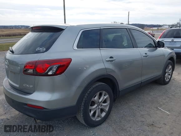 ✅ 2015 Mazda CX-9 Touring • VIN: JM3TB2CVXF0455691 • Lot: 43916875. Listed on IAAI with 207,507 mi. Free auction sales archive from the USA and detailed vehicle history report at DreamBid. Image 4.