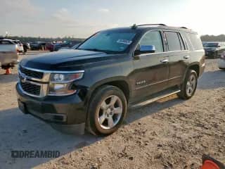2017 Chevrolet Tahoe LS with VIN 1GNSCAKC1HR364438, listed as a Copart auction lot 80368625 with 197,741 mi miles and Salvage title. Bid and sale history available at DreamBid. Image 1.
