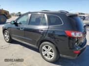 ✅ 2012 Hyundai Santa Fe Limited • VIN: 5XYZK4AG3CG157279 • Lot: 76894754. Listed on Copart with 127,061 mi. Free auction sales archive from the USA and detailed vehicle history report at DreamBid. Image 2.