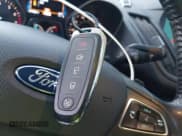 ✅ 2017 Ford Escape Titanium • VIN: 1FMCU0JD0HUC13307 • Lot: 43883887. Wystawiony na IAAI z przebiegiem 71 756 mil. Bezpłatny archiwum sprzedaży aukcyjnych z USA i szczegółowy raport historii pojazdu na DreamBid. Zdjęcie 11.