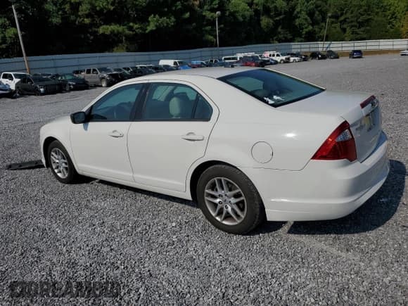 ✅ 2012 Ford Fusion S • VIN: 3FAHP0GA1CR428991 • Лот: 69211585. Опубликован ранее на Copart с пробегом 130 148 миль. Бесплатный доступ к архиву аукционных продаж из США и подробный отчёт об истории автомобиля на DreamBid. Изображение 2.