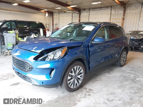 ✅ 2022 Ford Escape Titanium Hybrid • VIN: 1FMCU9DZ3NUA57450 • Lot: 42242619. Listed on IAAI with 31,989 mi. Free auction sales archive from the USA and detailed vehicle history report at DreamBid. Image 2.