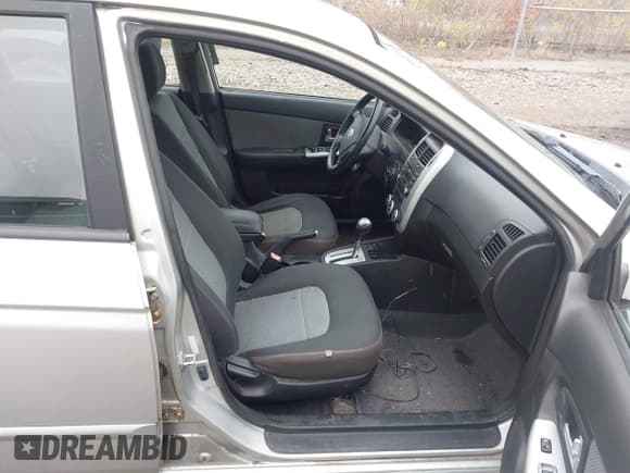 ✅ 2009 Kia Spectra EX • VIN: KNAFE222095027380 • Lot: 43730880. Listed on IAAI with 200,112 mi. Free auction sales archive from the USA and detailed vehicle history report at DreamBid. Image 5.