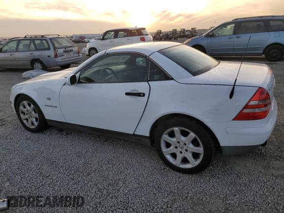 ✅ 2000 Mercedes-Benz SLK 230 Kompressor • VIN: WDBKK47F8YF169677 • Lot: 88743035. Listed on Copart with 141,680 mi. Free auction sales archive from the USA and detailed vehicle history report at DreamBid. Image 2.