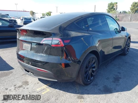 ✅ 2023 Tesla Model Y Long Range • VIN: 7SAYGAEE5PF879096 • Лот: 43230827. Опубликован ранее на IAAI с пробегом 25 665 миль. Бесплатный доступ к архиву аукционных продаж из США и подробный отчёт об истории автомобиля на DreamBid. Изображение 4.