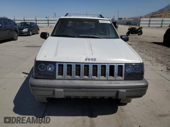 ✅ 1994 Jeep Grand Cherokee Laredo • VIN: 1J4GZ58S6RC310800 • Лот: 64095725. Опубликован ранее на Copart с пробегом 241 876 миль. Бесплатный доступ к архиву аукционных продаж из США и подробный отчёт об истории автомобиля на DreamBid. Изображение 5.