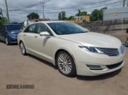 ✅ 2014 Lincoln MKZ • VIN: 3LN6L2G92ER814476 • Lot: 42768605. Listed on IAAI with 76,122 mi. Free auction sales archive from the USA and detailed vehicle history report at DreamBid. Image 1.