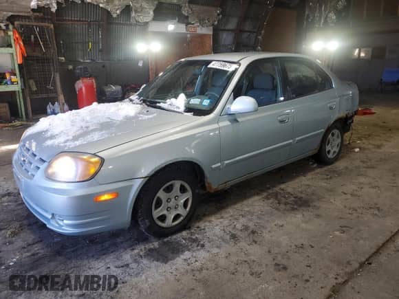 2005 Hyundai Accent GLS z VIN KMHCG45C15U602419, wystawiony jako Copart lot #47759675 z przebiegiem 58 133 mil mil oraz Szkoda całkowita • Salvage title. Historia ofert i sprzedaży dostępna na DreamBid. Obrazek 1.